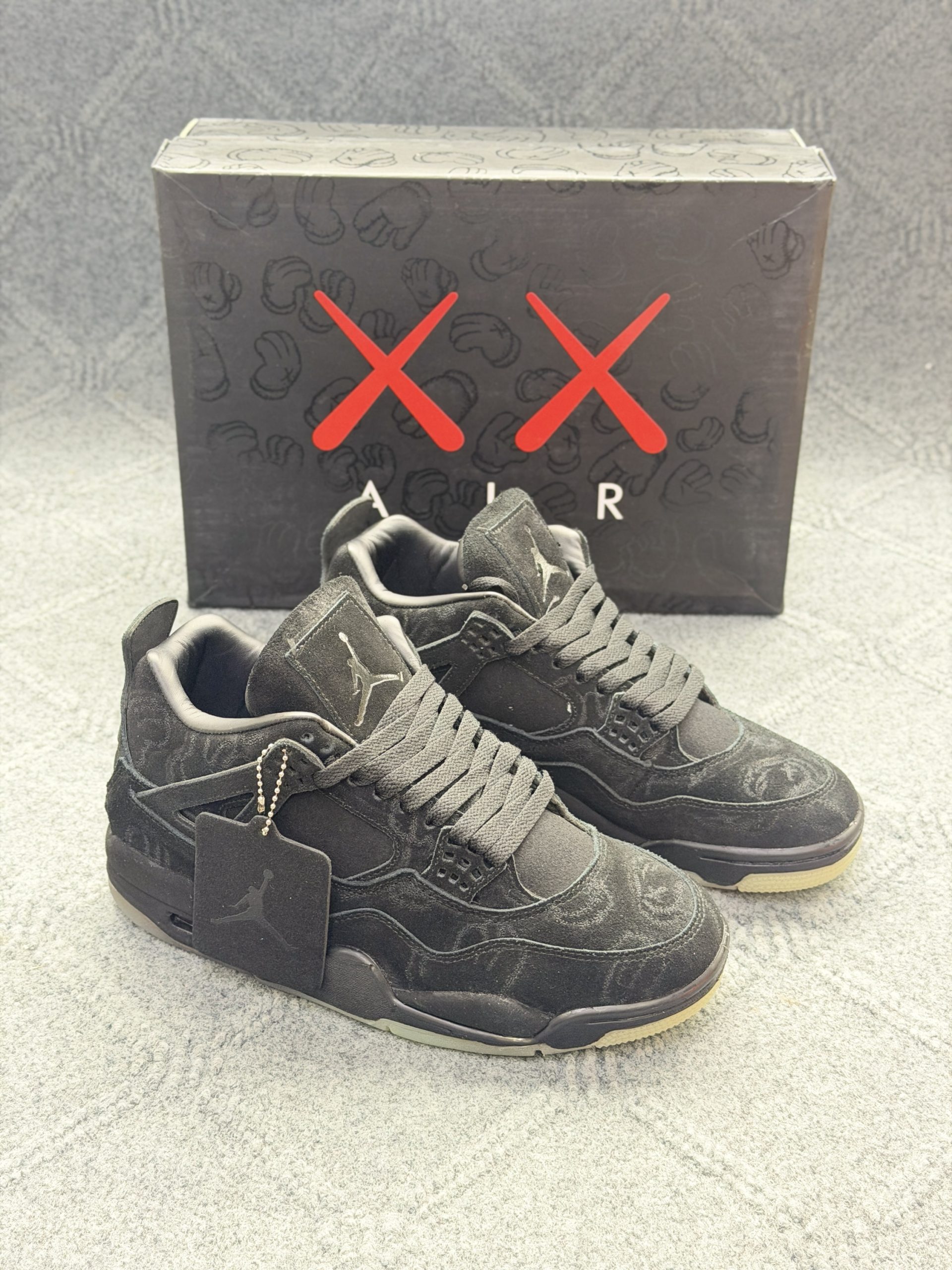 Air Jordan 4 "KAWS Black" Premium 1.1
